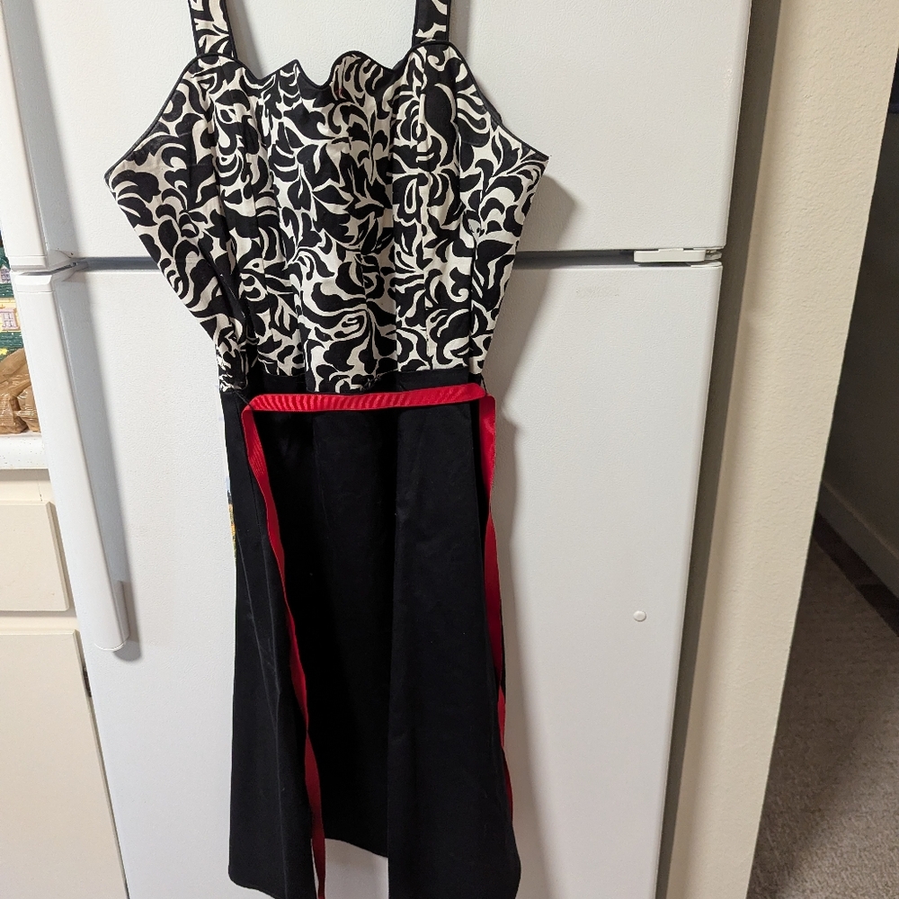 Black and White Patterned Dress with Red Accents